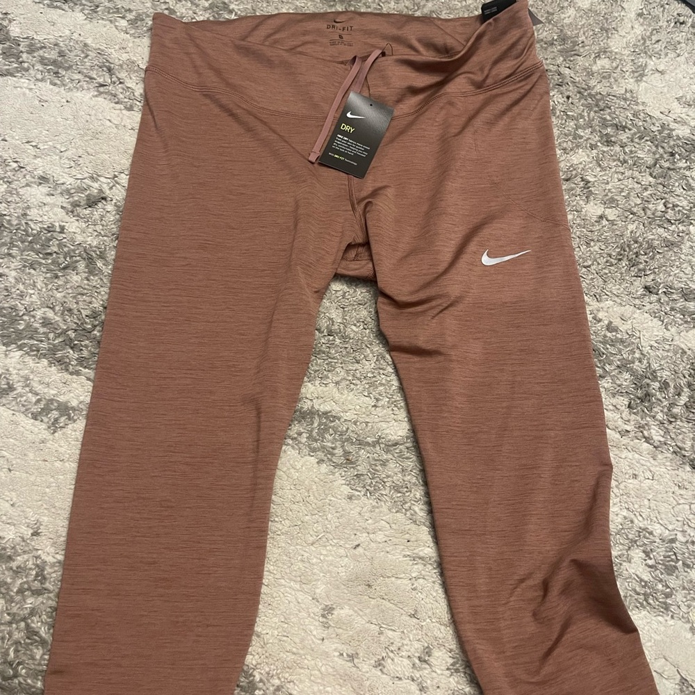 Brown Nike crop leggings